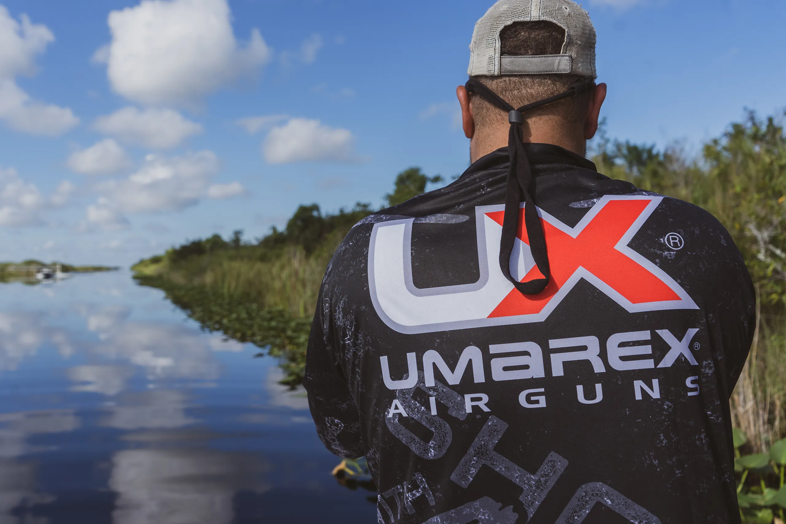 Corey Brossman bowfishing on calm water